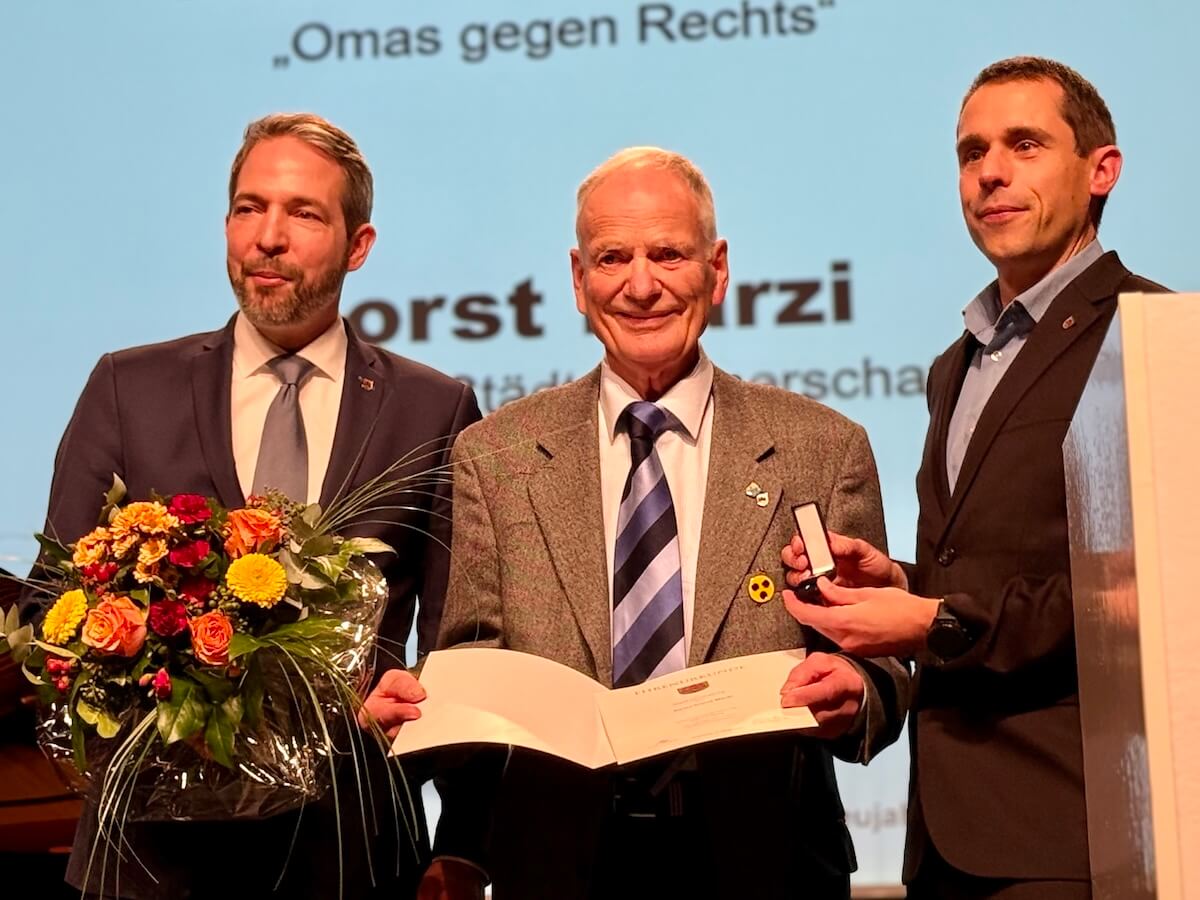 Drei Männer auf einer Bühne, Neujahrsempfang Ahrensburg 2026